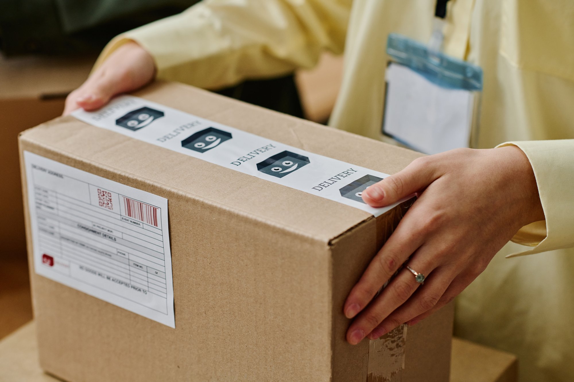 hands-of-young-female-volunteer-holding-packed-car-2025-04-01-08-15-52-utc