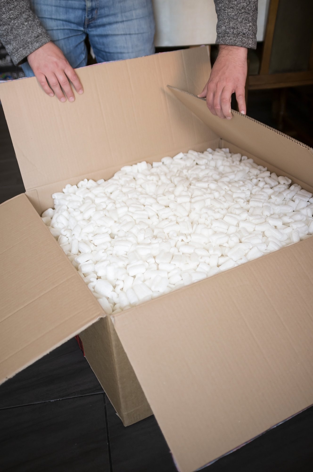 unpacking-a-box-with-a-fragile-item-2025-01-15-12-39-50-utc
